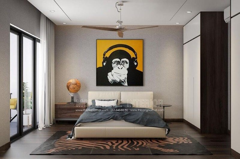 Trang trí phòng ngủ hiện đại đẹp với tranh canvas treo tường cùng quả địa cầu độc đáo.